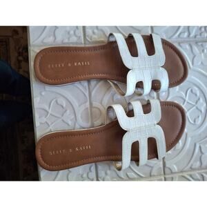 Kelly and Katie white slip-on sandals
